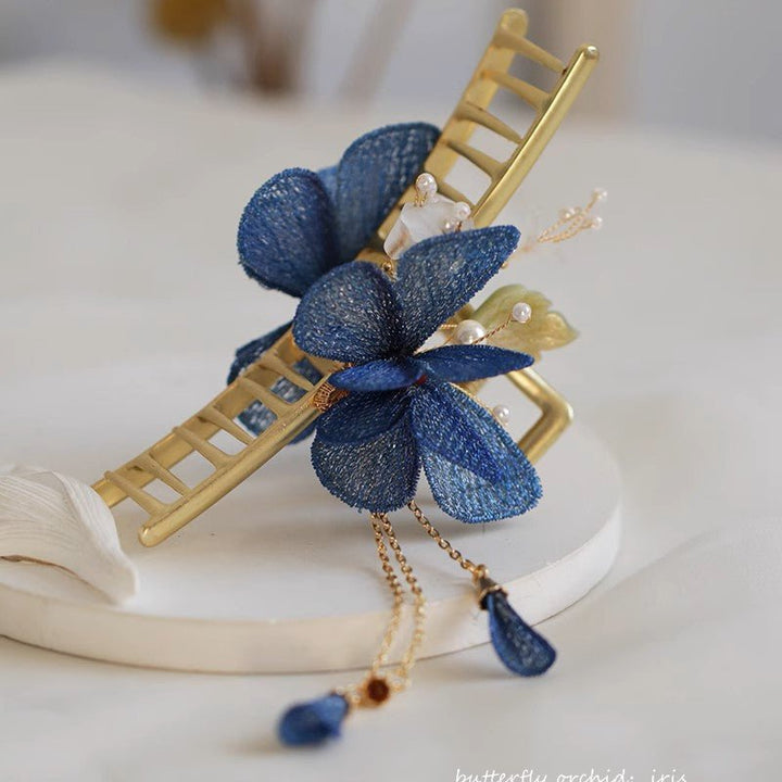 Blaue Schmetterlings-Blumengarten-Haarklammer