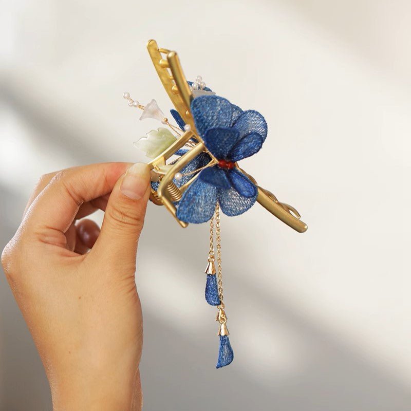 Blaue Schmetterlings-Blumengarten-Haarklammer
