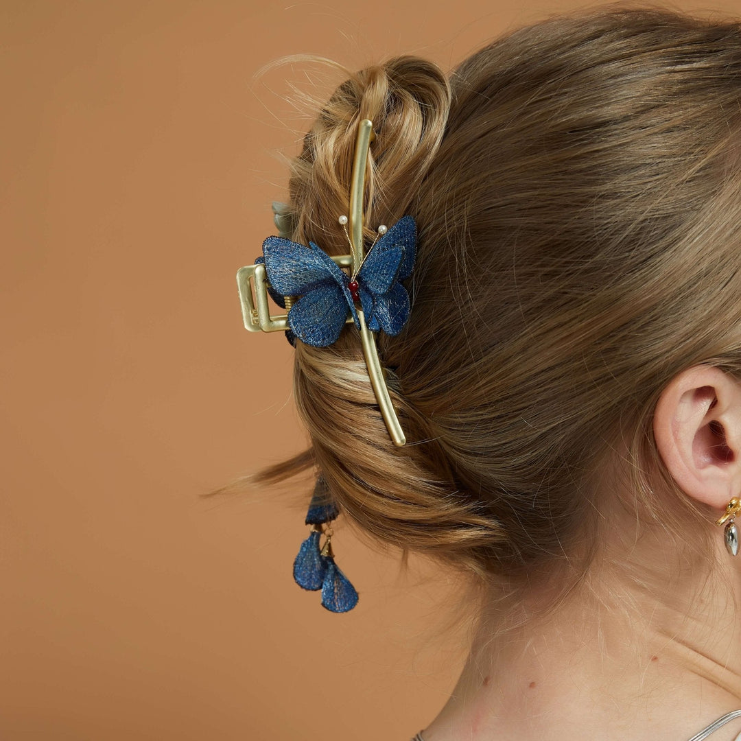 Blaue Schmetterlings-Blumengarten-Haarklammer