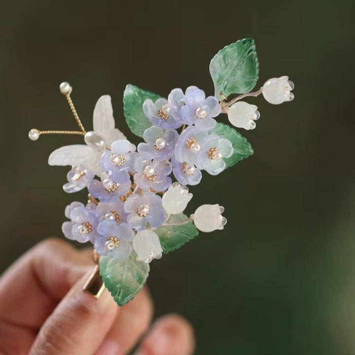 Lila Blume Schmetterling Garten Haarspange
